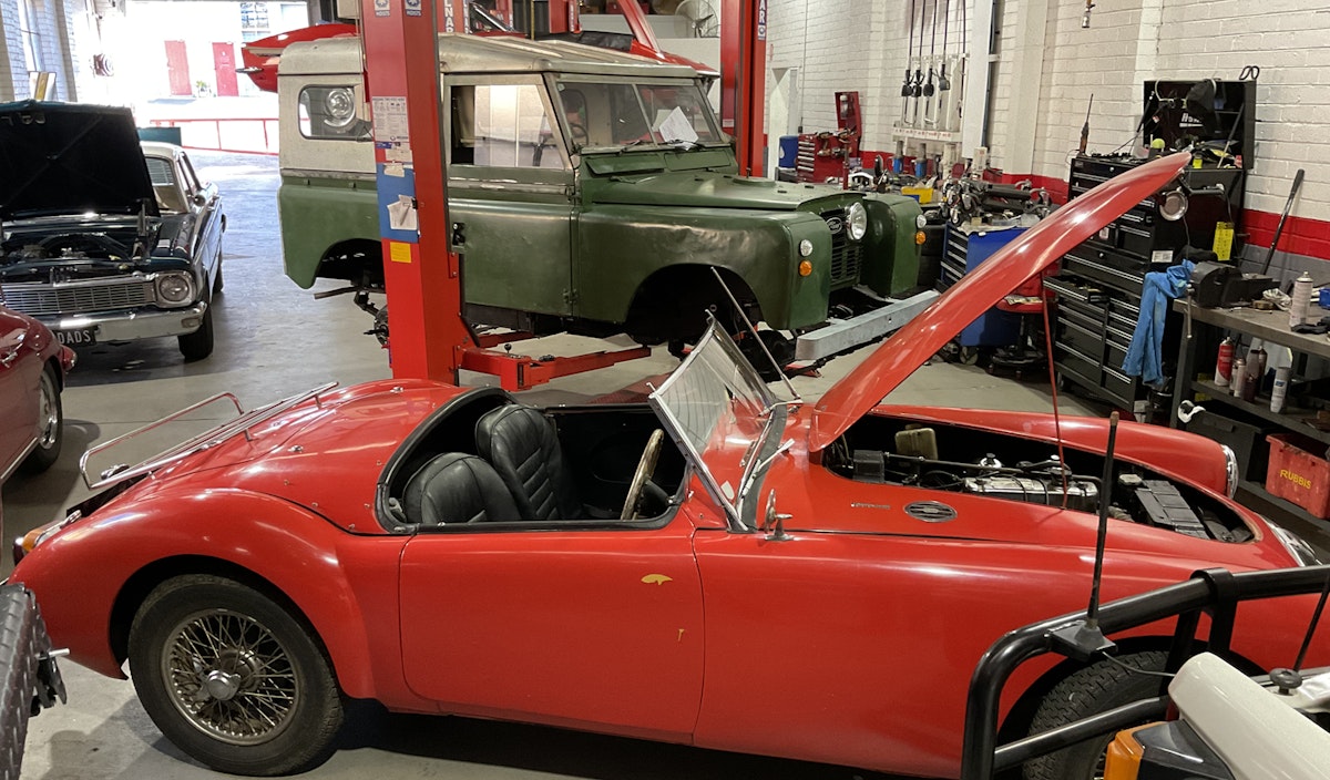 Who doesn't love an MG. This MGA Convertable 1955 -1962 is such a classic. This one even sports a stylish luggage rack on the rear.

Fun Facts
1957  British legend, Sir Stirling Moss, broke the land speed record in the mid-engined MG EX 181, nicknamed 'Roaring Raindrop', at Salt Flats, Utah. He smashed the previous record, driving at 395.31 km/h, 20% faster than the previous record holder. (mgmotor.com.au History)
1962  The MGA model was strengthened by the addition of the more comfortable MGB model. Great fun to drive with a shorter chassis and larger cabin. Produced until 1980, it was the most successful MG ever made. (mgmotor.com.au History)